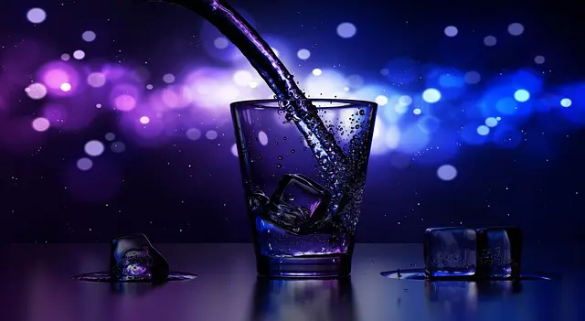 A glass of water is being poured into it.