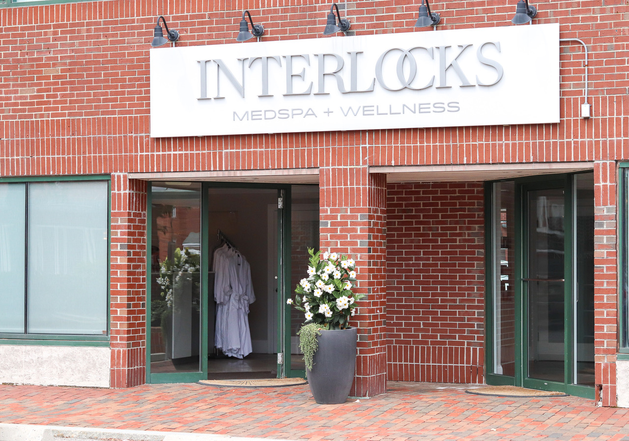 A person is entering an interlocks wellness center.