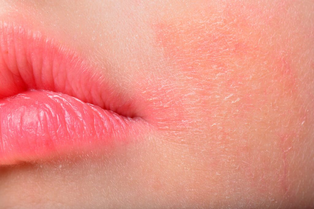 A close up of the lips and tongue of a person