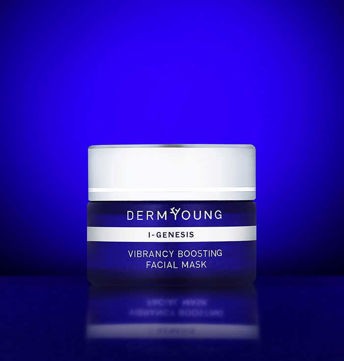 A blue lit up picture of derm young facial mask.